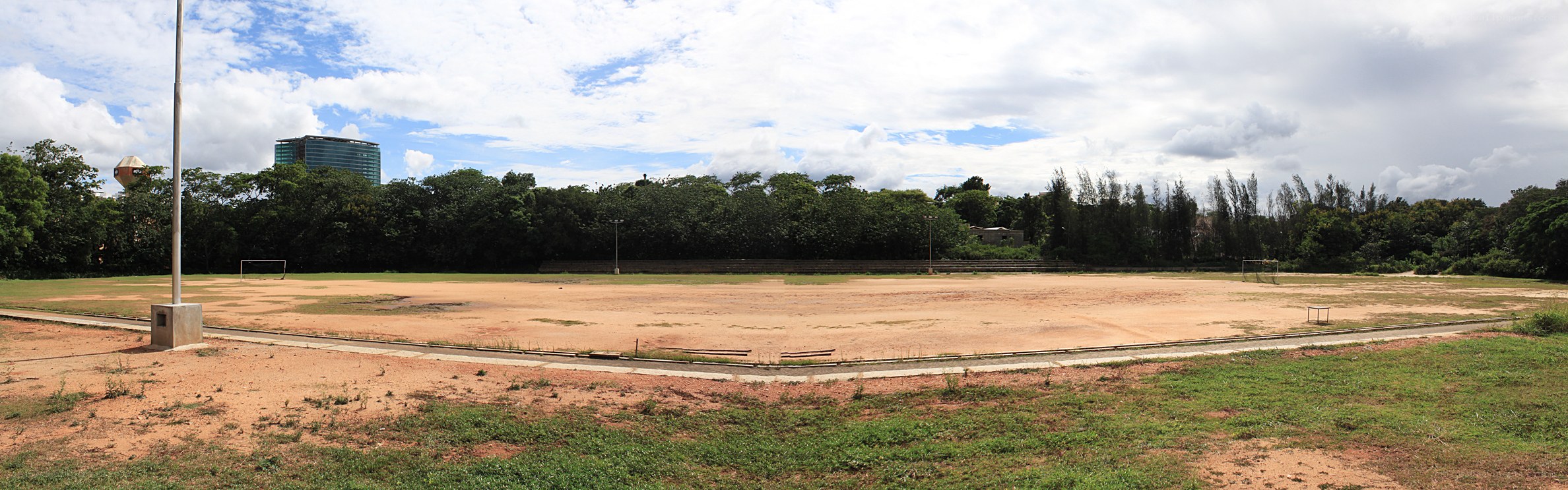 empty sports field with city view