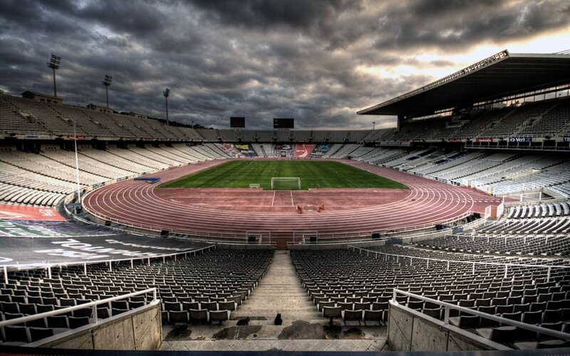 empty stadium under stormy sky