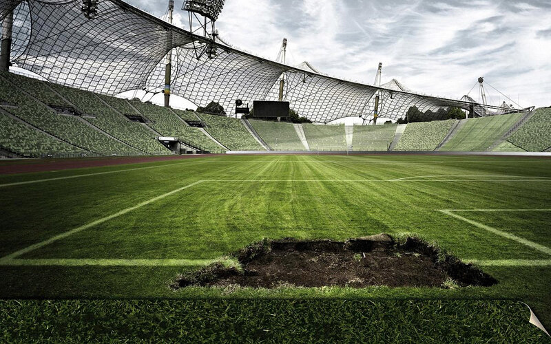 Empty stadium with damaged field