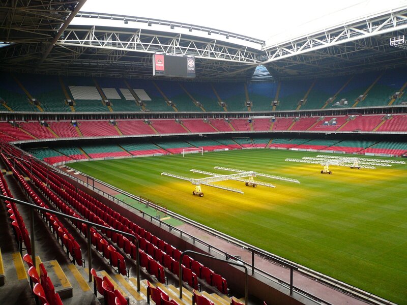 empty stadium with green field