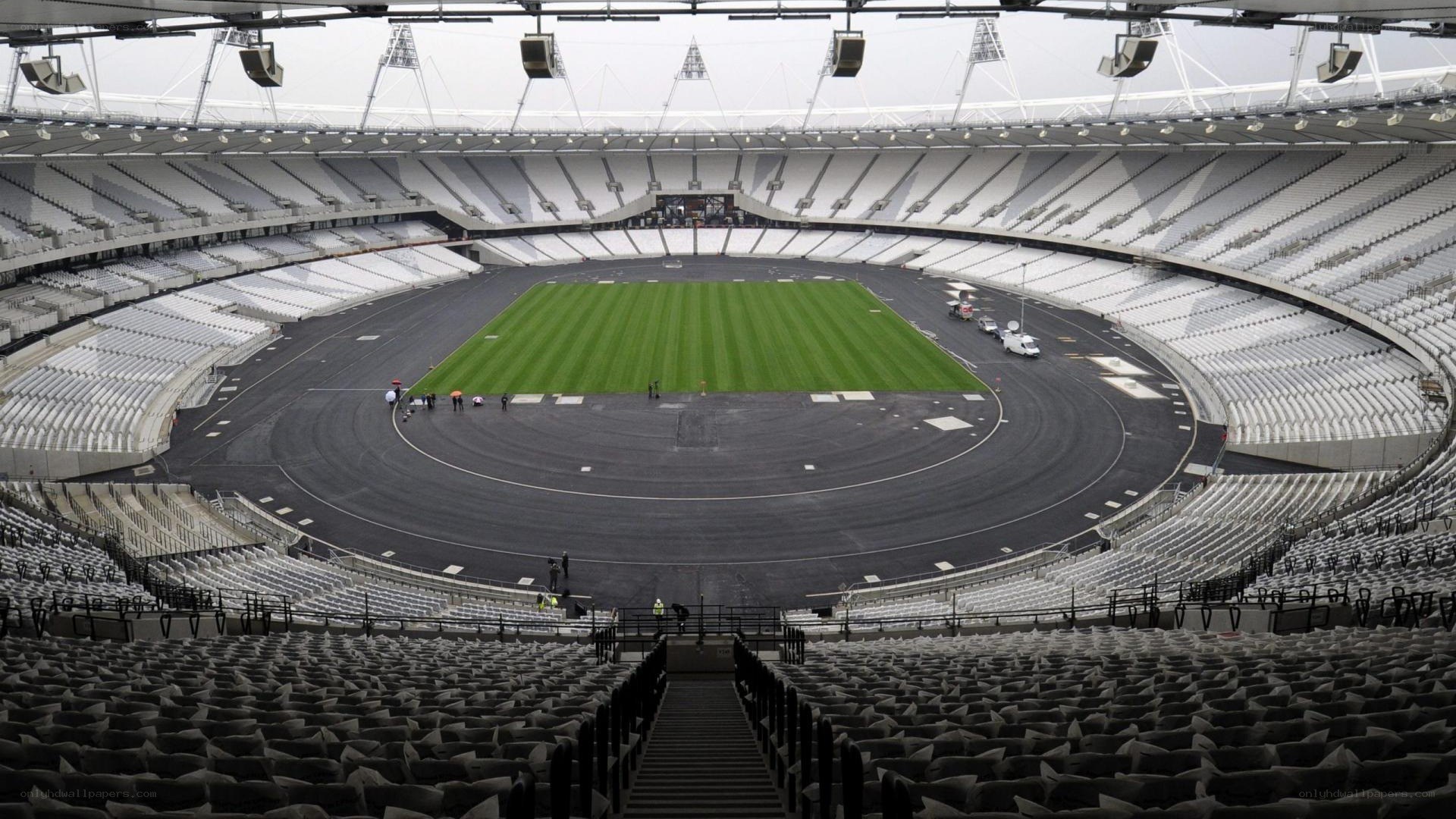 empty stadium with green field