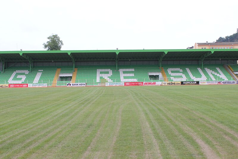 empty stadium with green seats