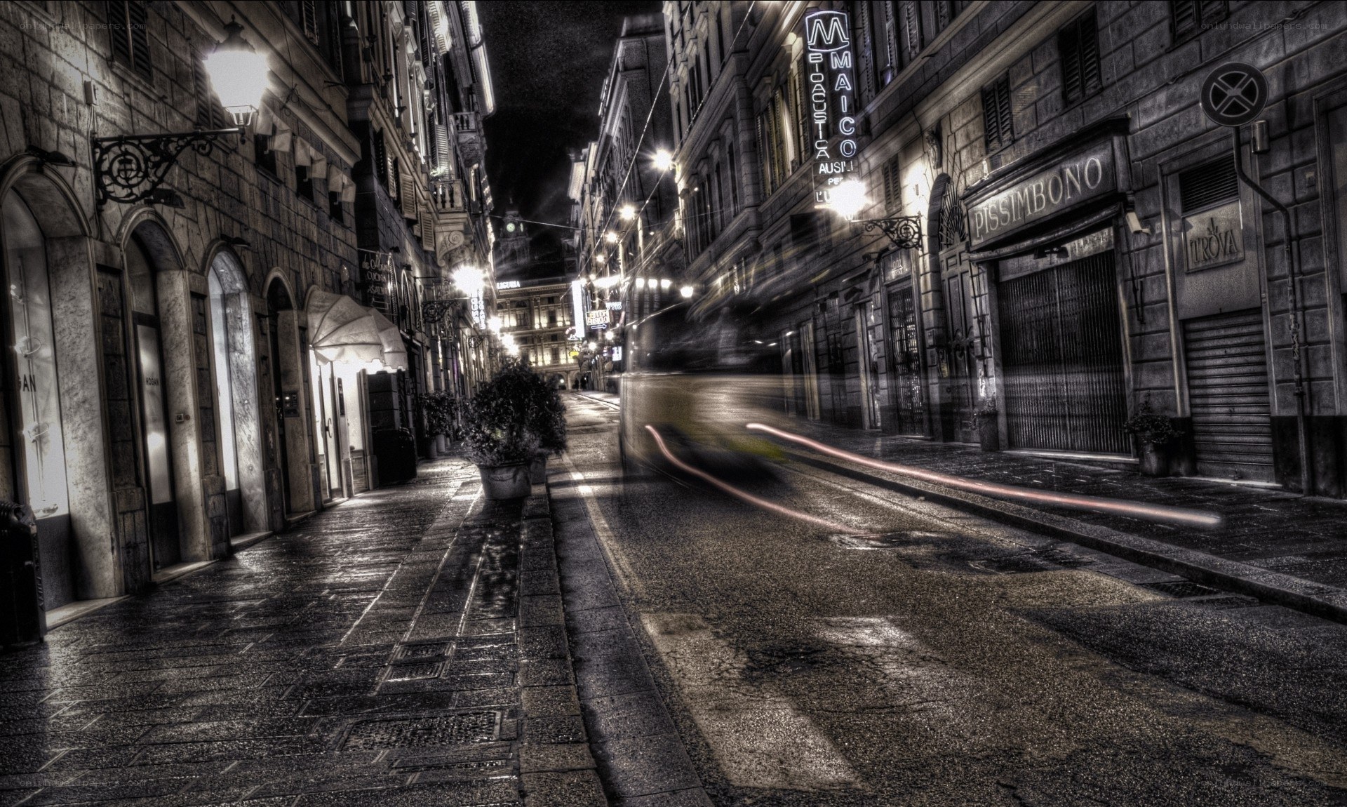 Empty street at night in Rome