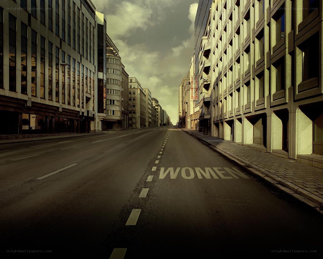 Empty street with 'WOMEN' painted