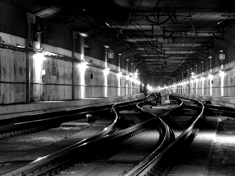 Empty subway tunnel with tracks