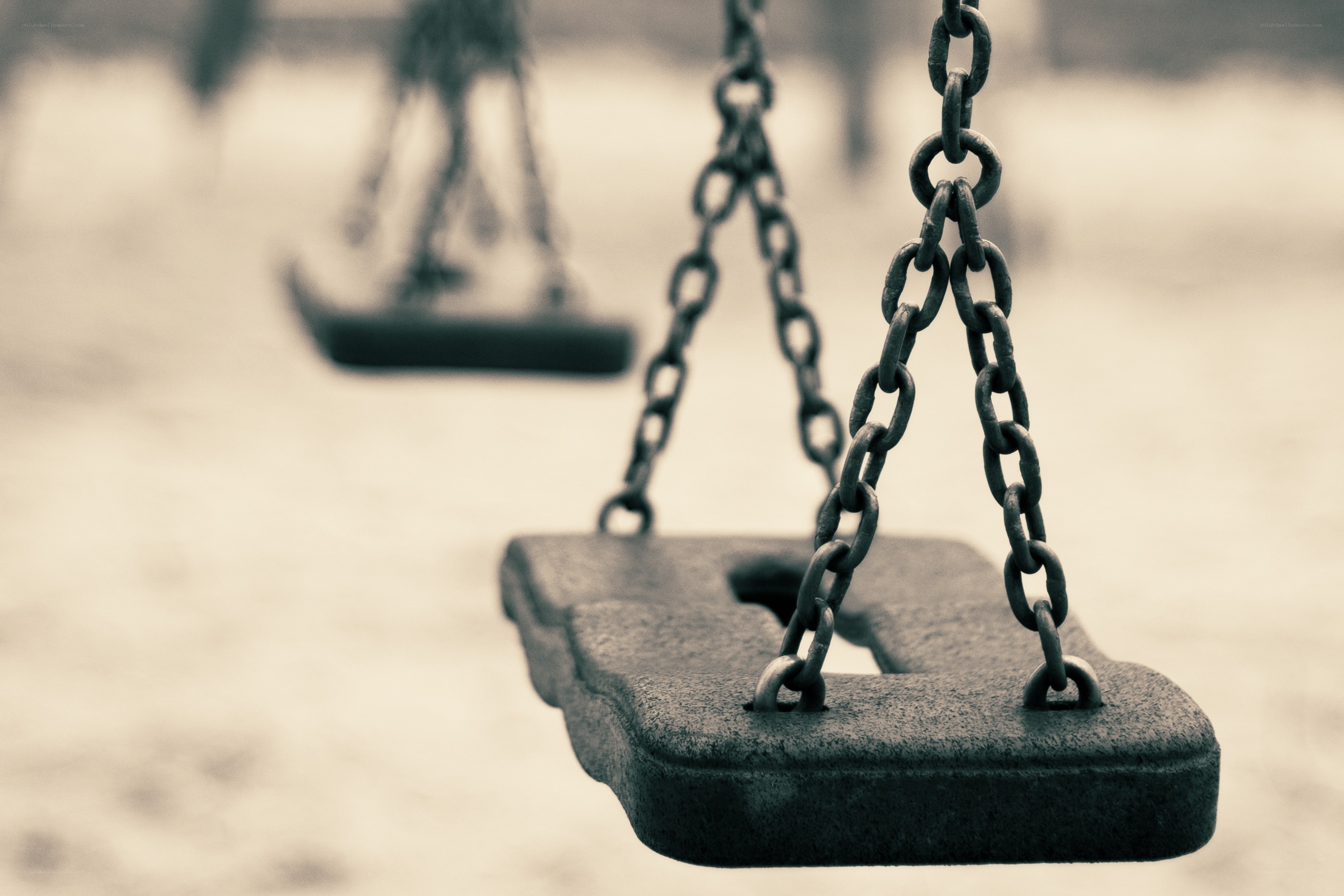 Empty swing in a quiet park