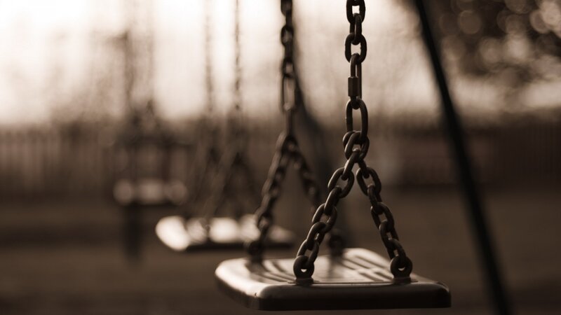Empty Swing in Park — Brown