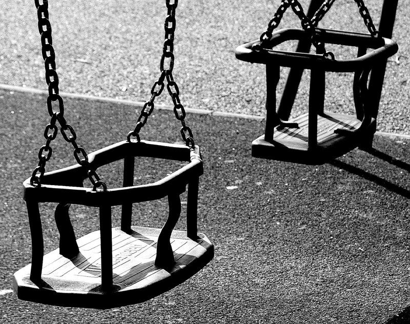 Empty swings at a playground