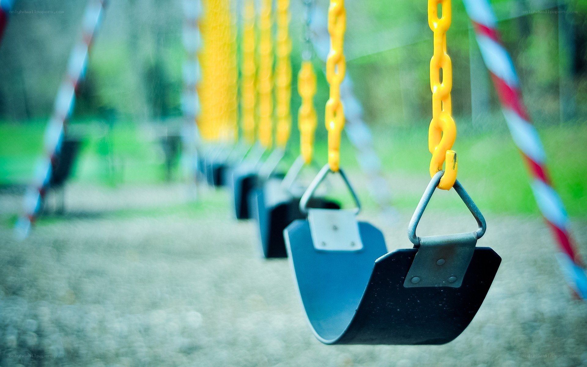 Empty swings in a playground