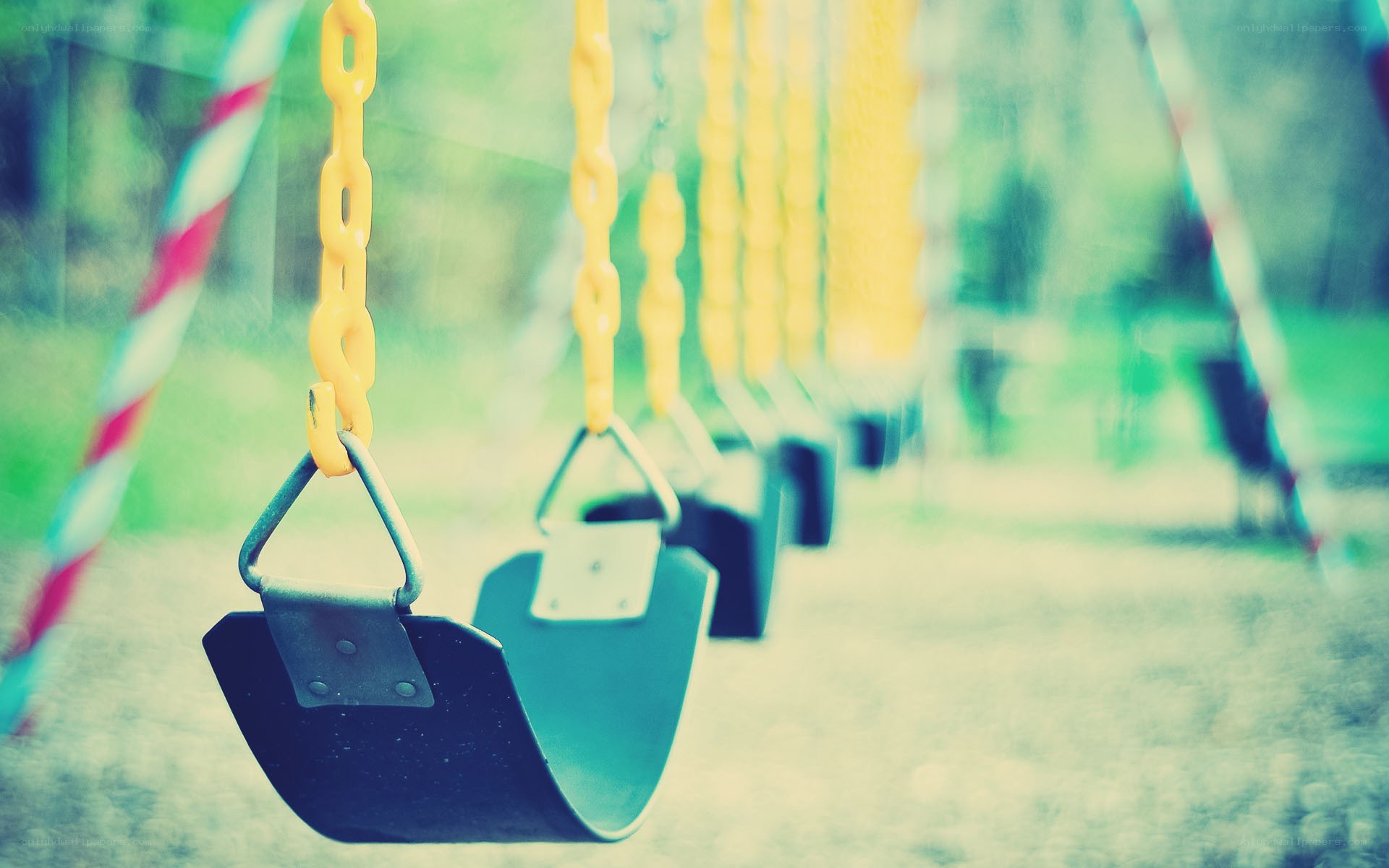 Empty swings in a playground