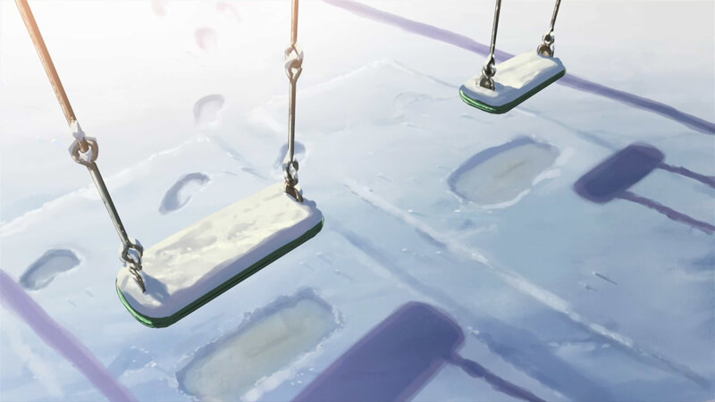 Empty swings in snow