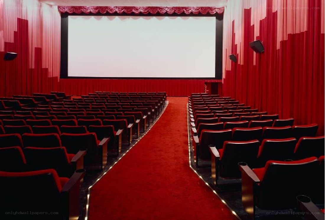Empty theater with red seats