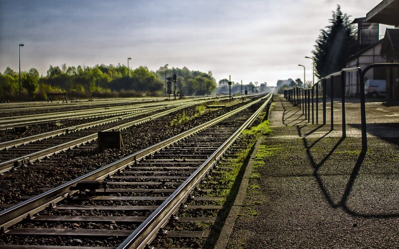 Empty train tracks at a station