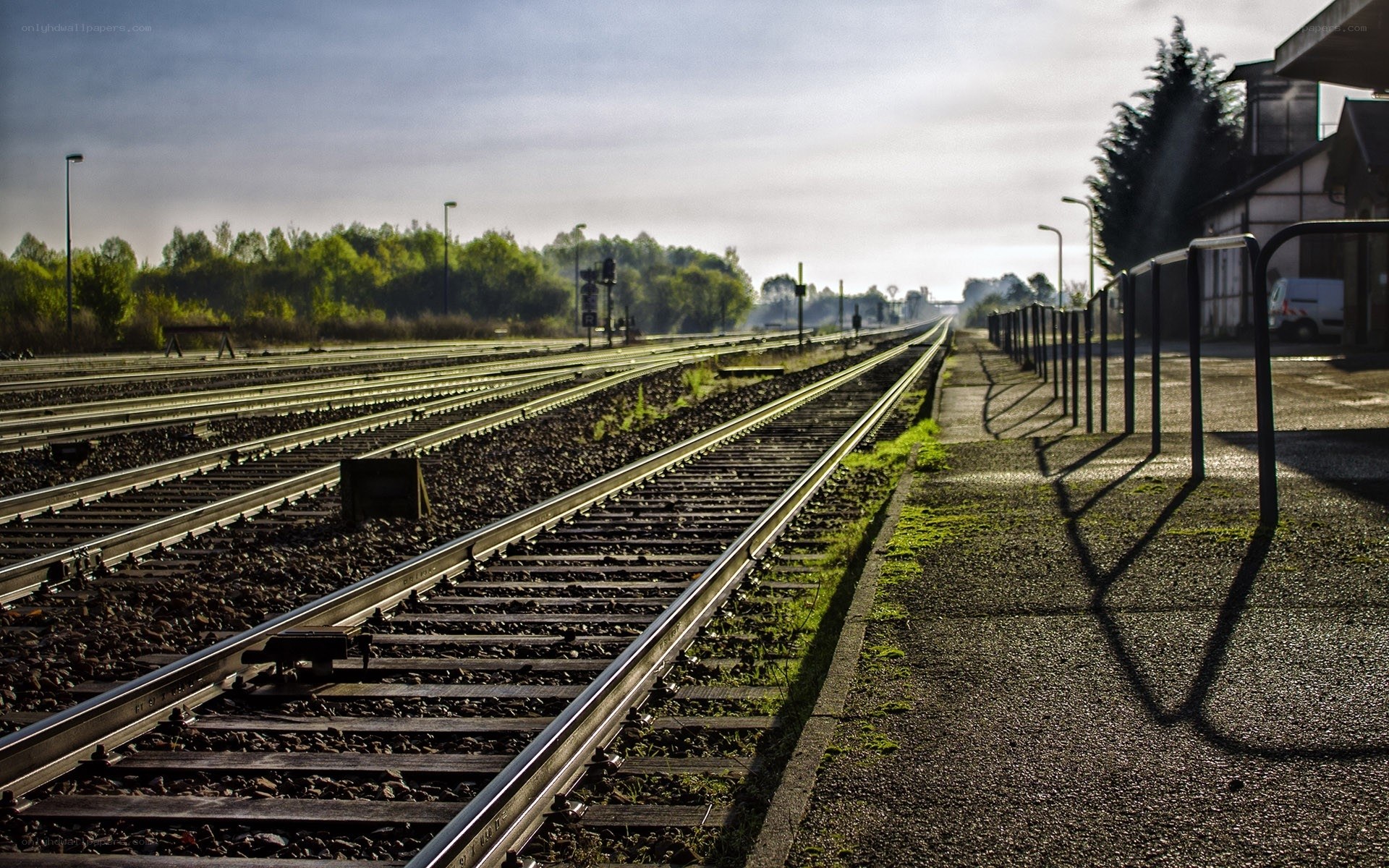 Empty train tracks at a station