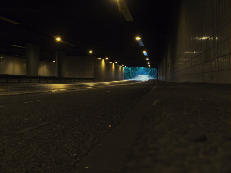 Empty tunnel at night