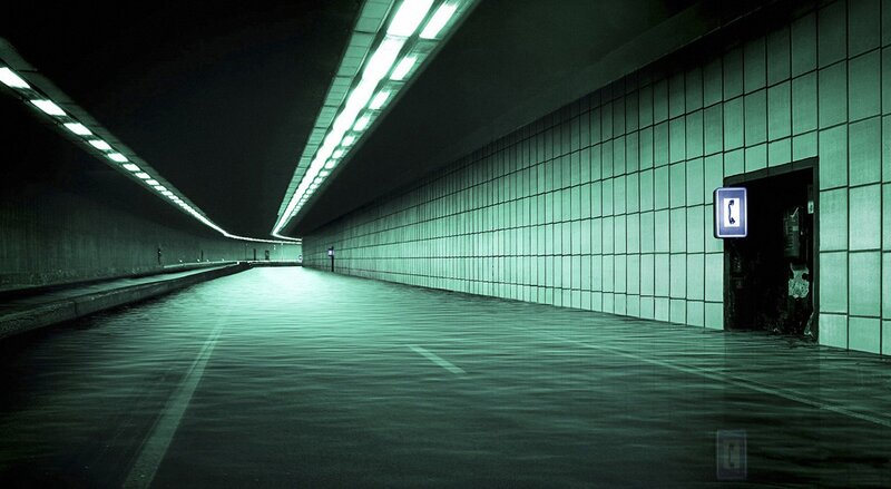 Empty tunnel with green lighting