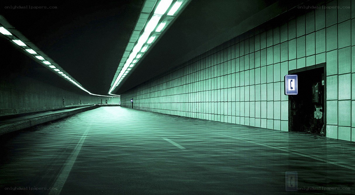 Empty tunnel with green lighting
