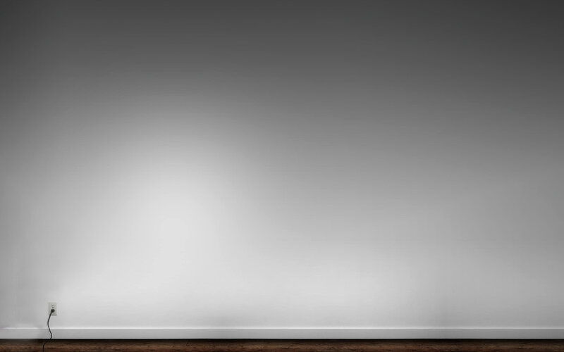 Empty Wall with Outlet — White