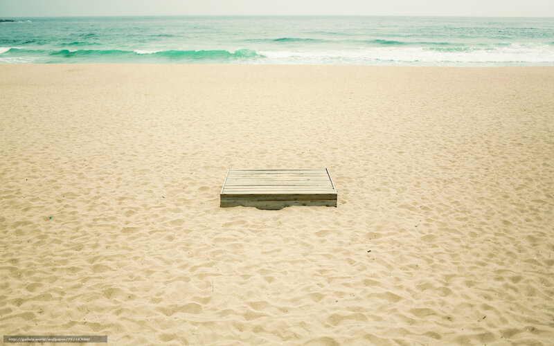 Empty wooden box on beach