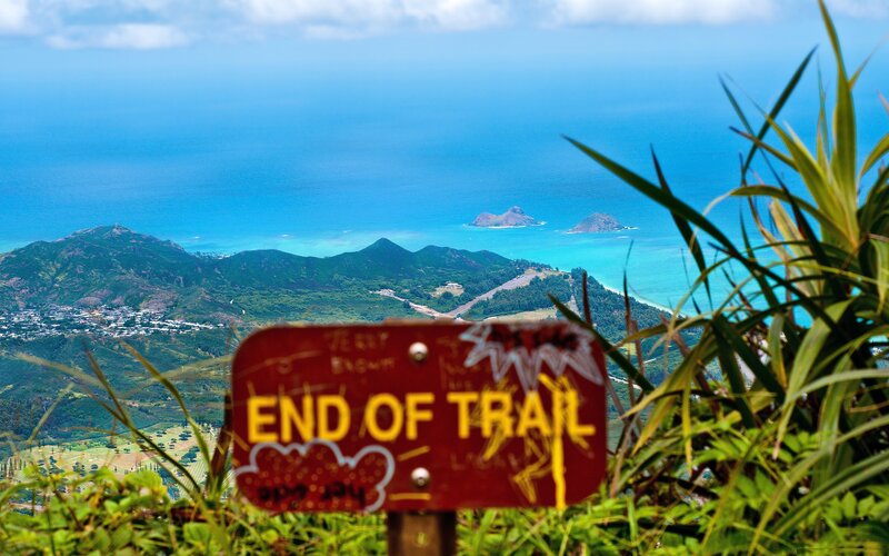 End of Trail sign with ocean view