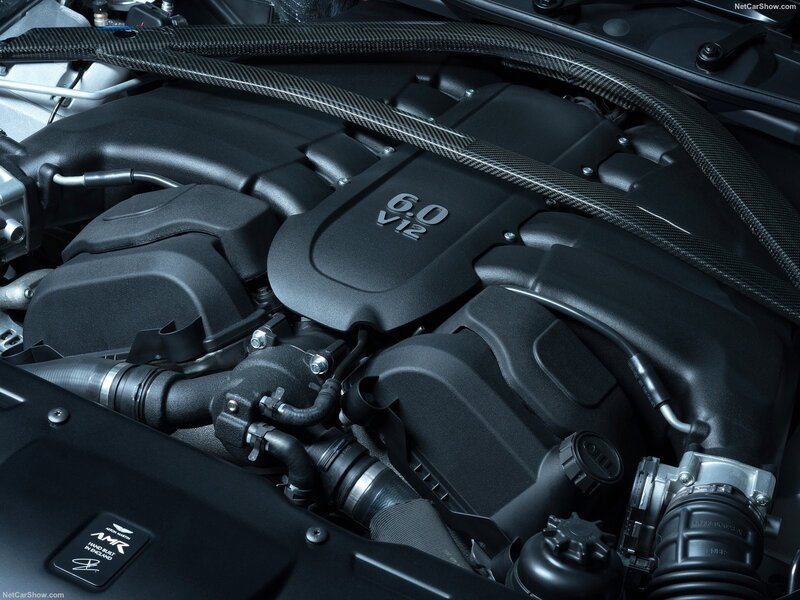 Engine Bay of a Car — Black, Technical, Photograph, Carbon Fiber