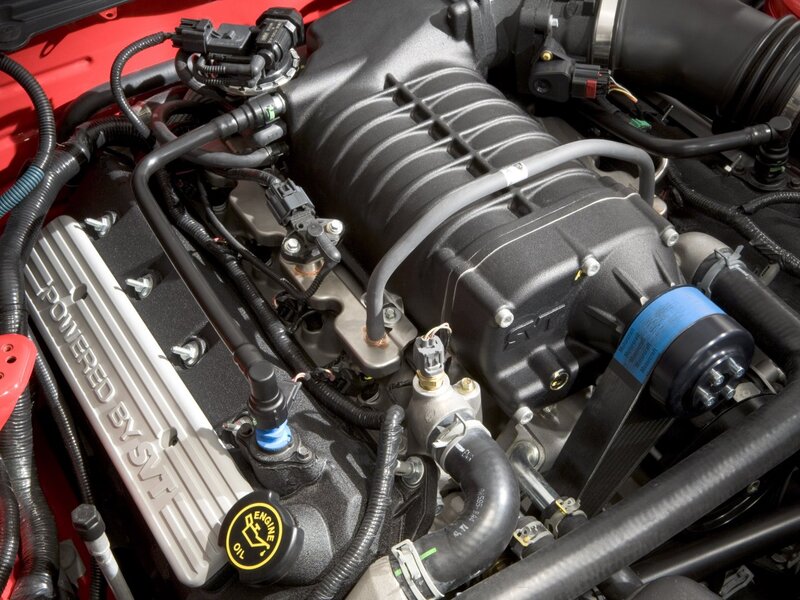 Engine Bay of a Car — Black, Technical, Photograph