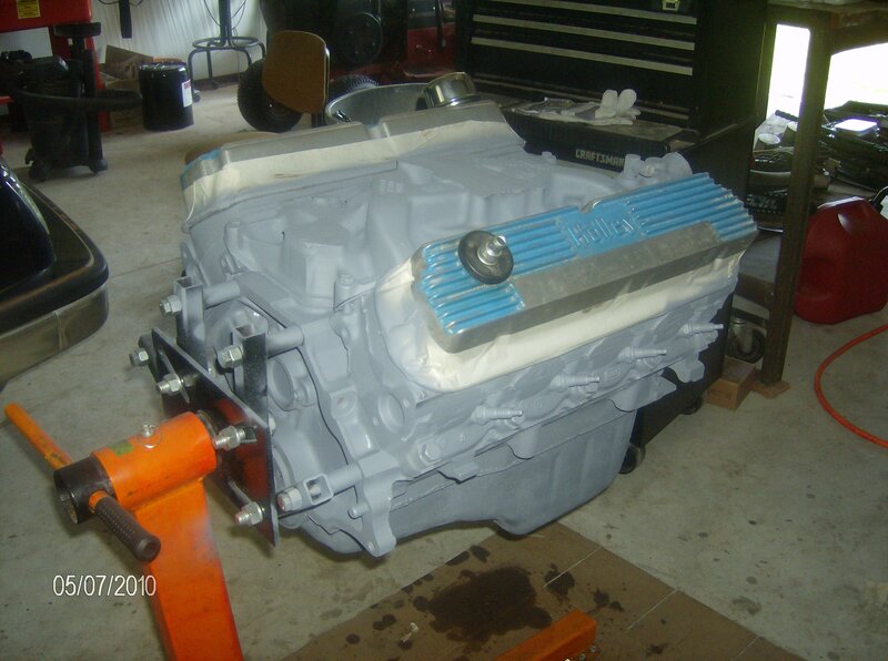 engine on a stand in garage