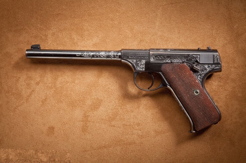 Engraved Colt pistol