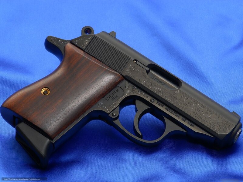 engraved pistol on blue