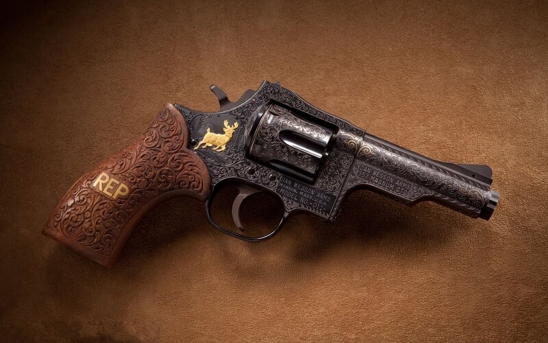 Engraved Revolver — Brown, Dramatic