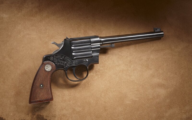 Engraved revolver on leather