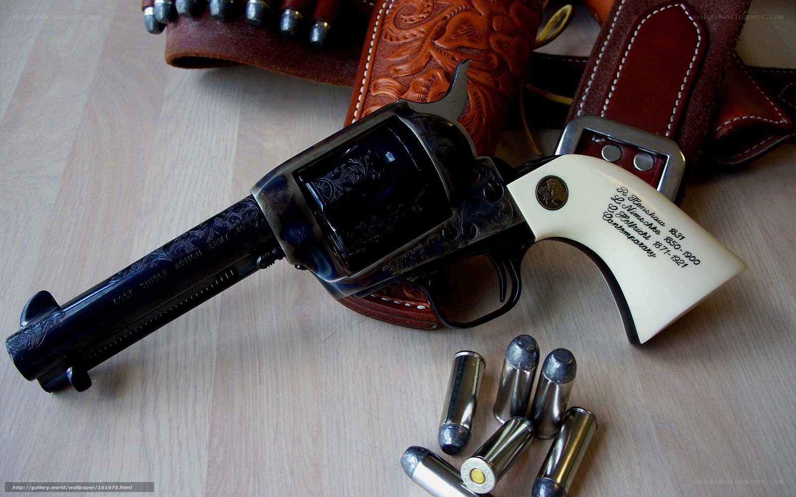 Engraved revolver with ammunition
