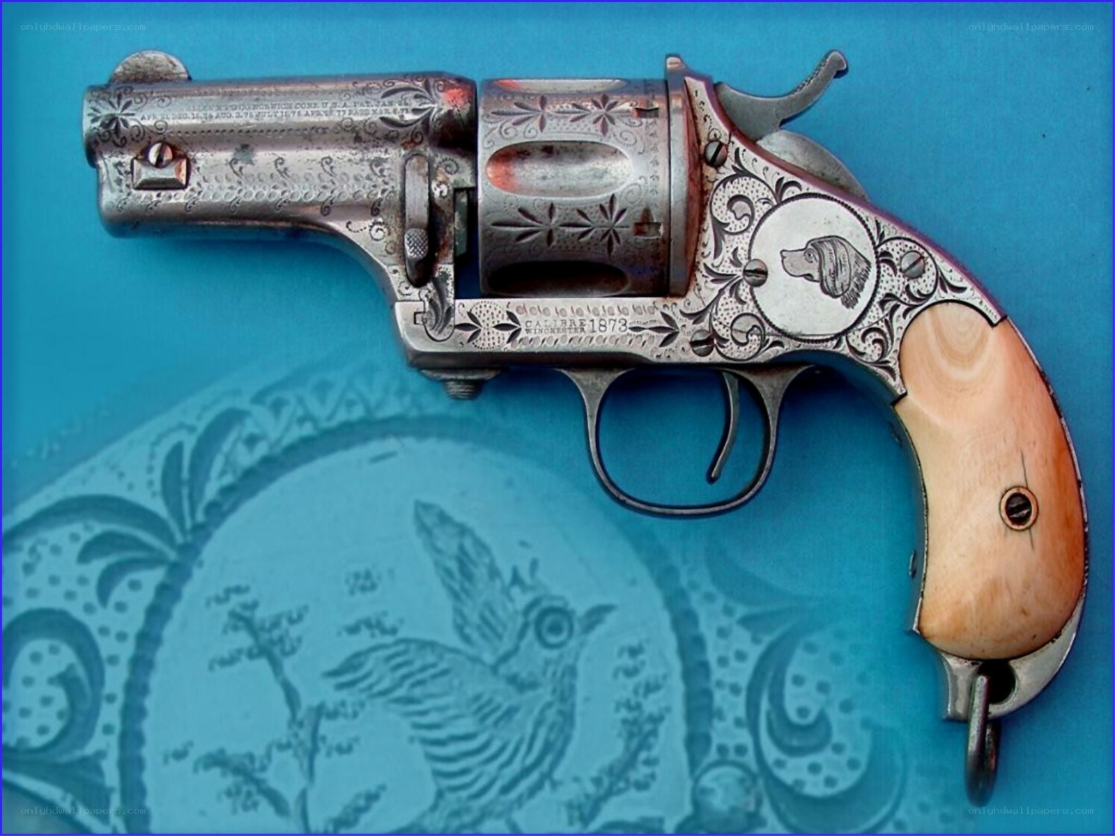 Engraved revolver with ivory grip