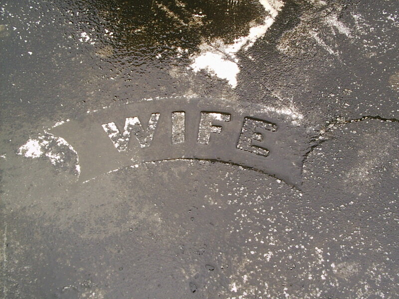 engraved word wife on stone