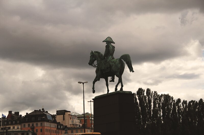equestrian statue under cloudy sky