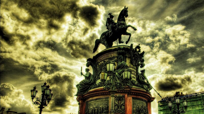 Equestrian statue under dramatic sky