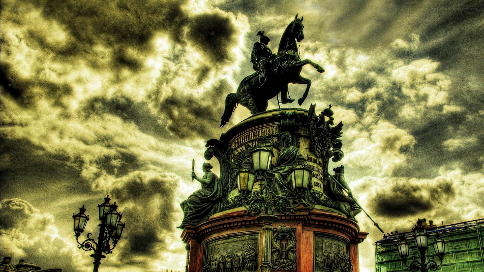 Equestrian statue under dramatic sky