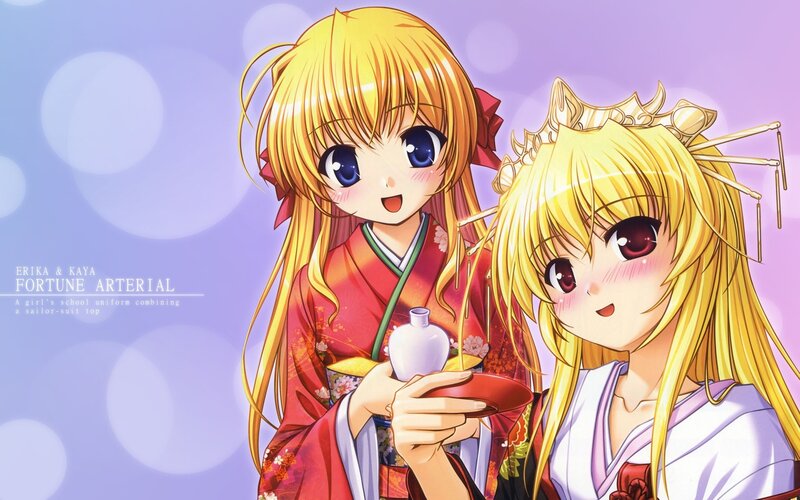 Erika and Kaya in traditional attire