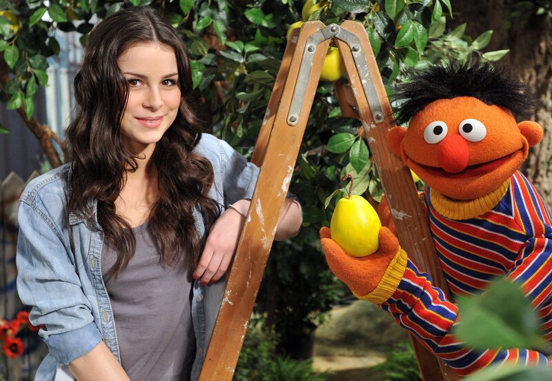 Ernie and a woman with pears