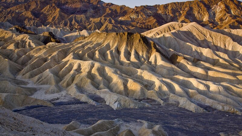 Eroded Badlands Landscape — Brown, Dramatic