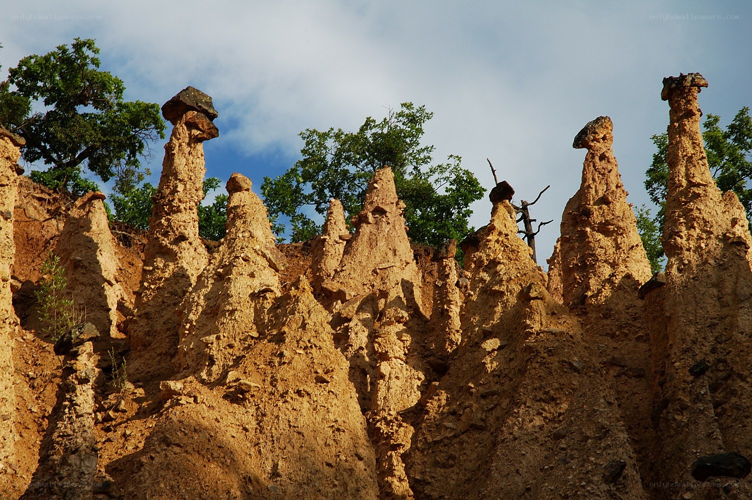 Eroded rock formations in natural landscape