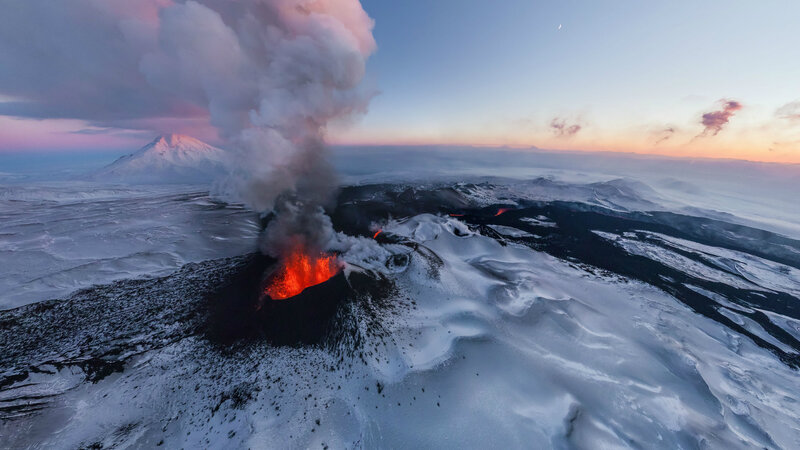 Erupting Volcano in Snow