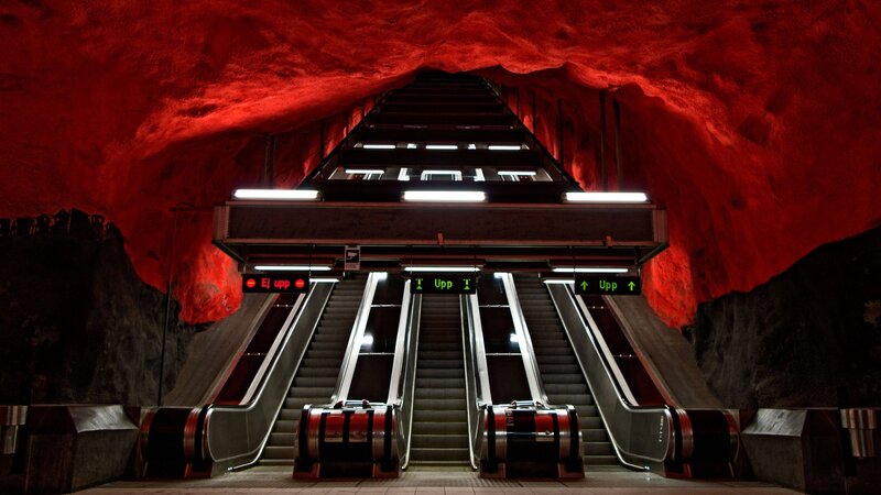 Escalators in Subway Station — Red, Dramatic, Photograph
