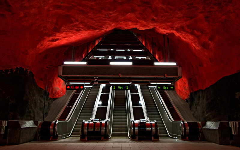 Escalators in Subway Station — Red, Dramatic
