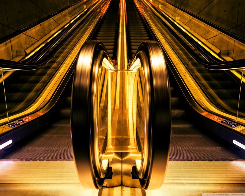 Escalators in Subway Station — Yellow, Dramatic, Night, Photograph, Escalator, Handrail, Lighting