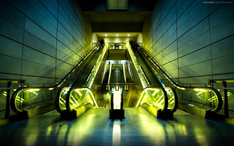 Escalators in Subway Station — Yellow, Dramatic, Night, Photograph, Escalator