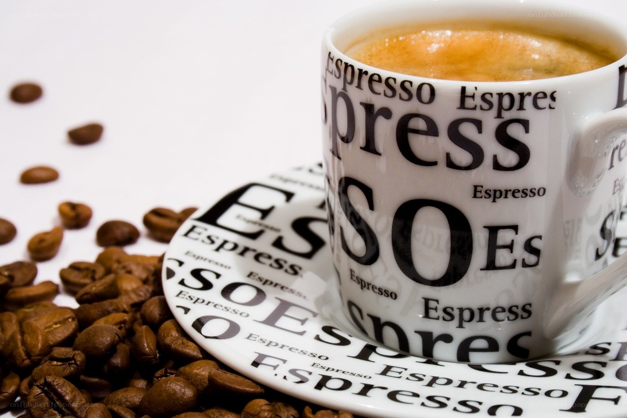 Espresso cup with coffee beans