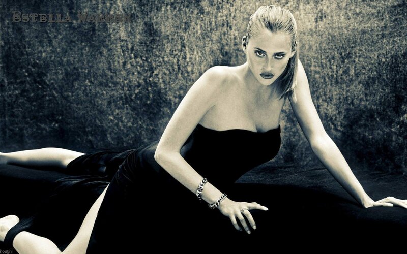 Estella Warren in black dress