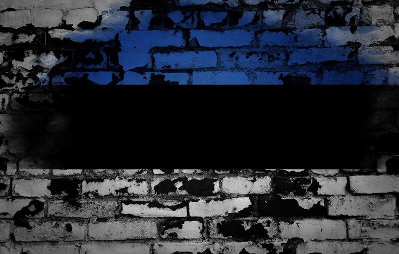 Estonian flag on brick wall