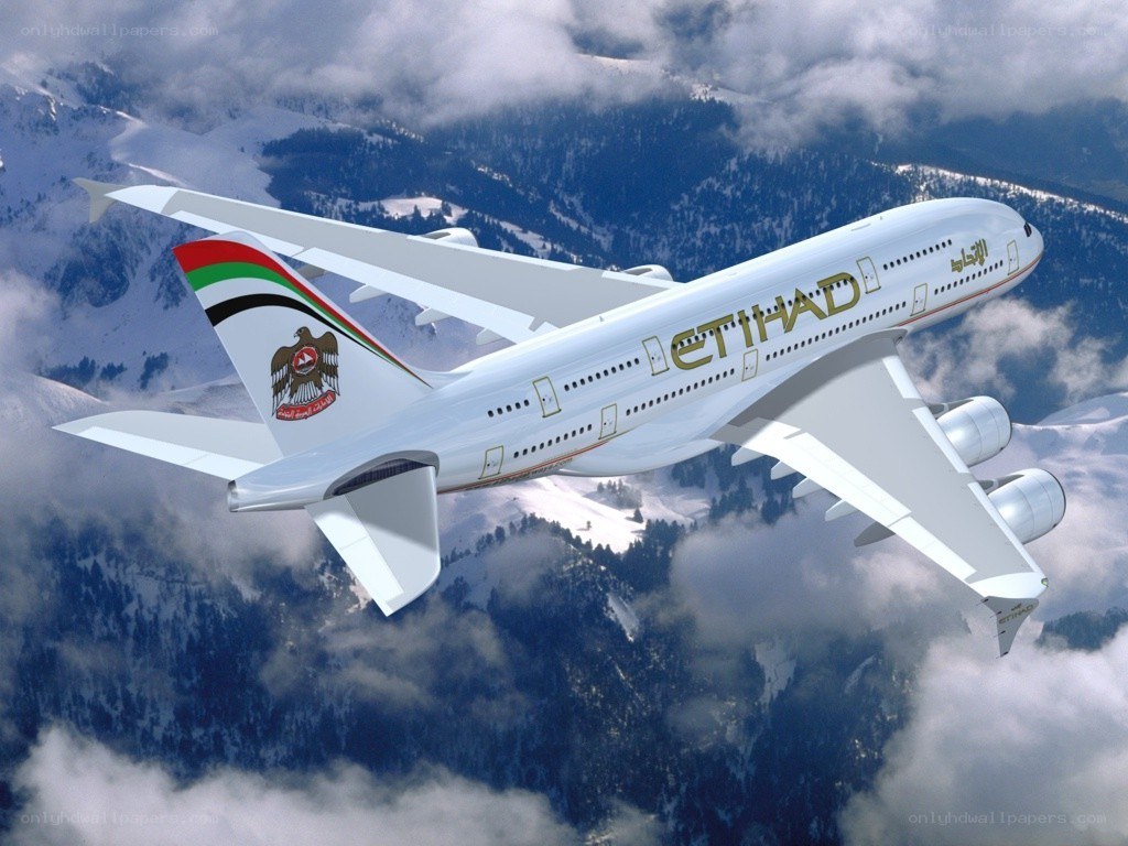 Etihad A380 over snowy mountains